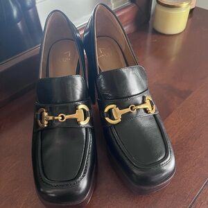 Women’s 8 Black Leather Marc Fisher LTD platform loafers. Style name “Machi”